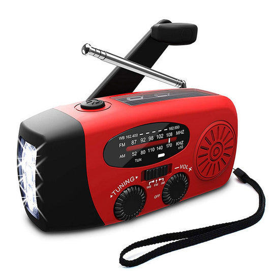 Solar hand crank radio flashlight